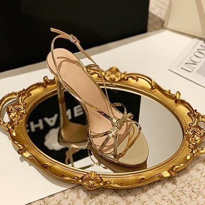 Golden strap high-heeled shoes for women in 2025, this year's new summer style with a single strap and slim heel, elegant ladies' sandals Golden strap high-heeled shoes for women in 2025, this year's new summer style with a single strap and slim heel, elegant ladies' sandals
