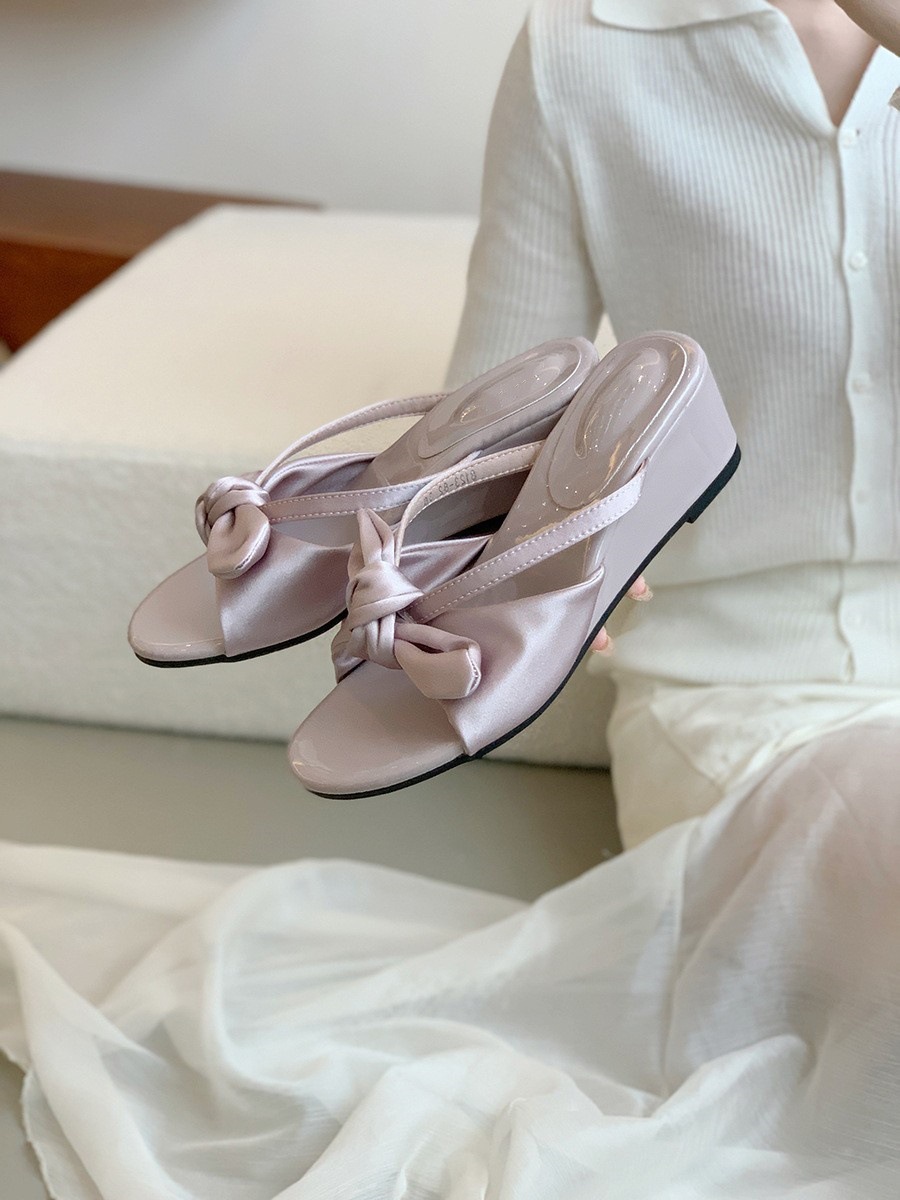 Slope heel leopard print slippers for women's summer outdoor wear, new French style dress with bow tie, cool slippers, vacation fairy style beach shoes Slope heel leopard print slippers for women's summer outdoor wear, new French style dress with bow tie, cool slippers, vacation fairy style beach shoes