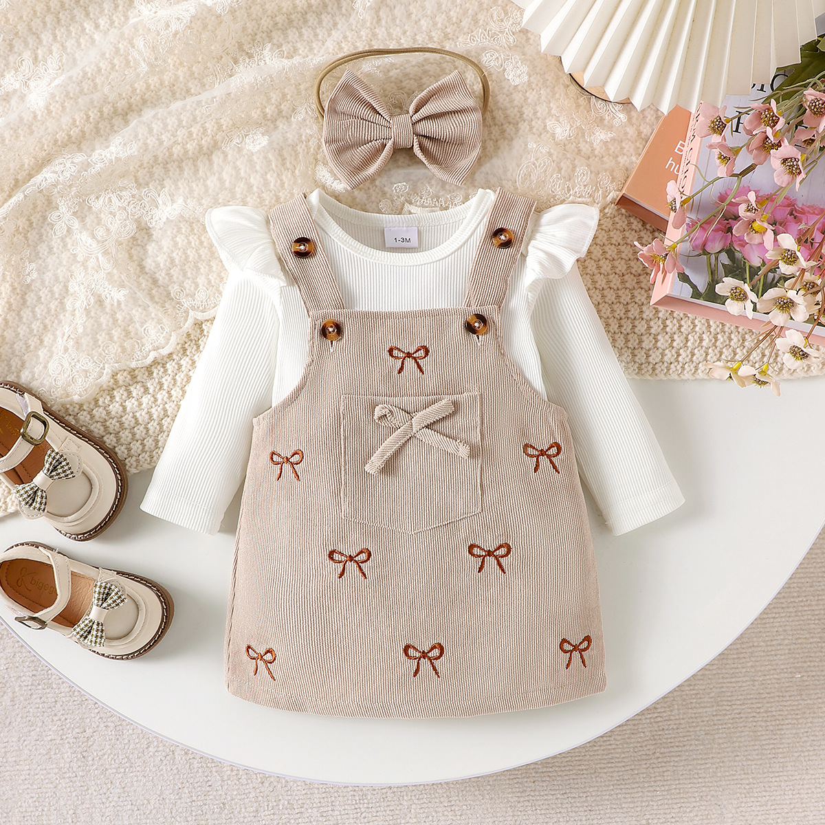Foreign trade children's clothing cute baby girl solid color long sleeved shirt with bow pattern suspender skirt set