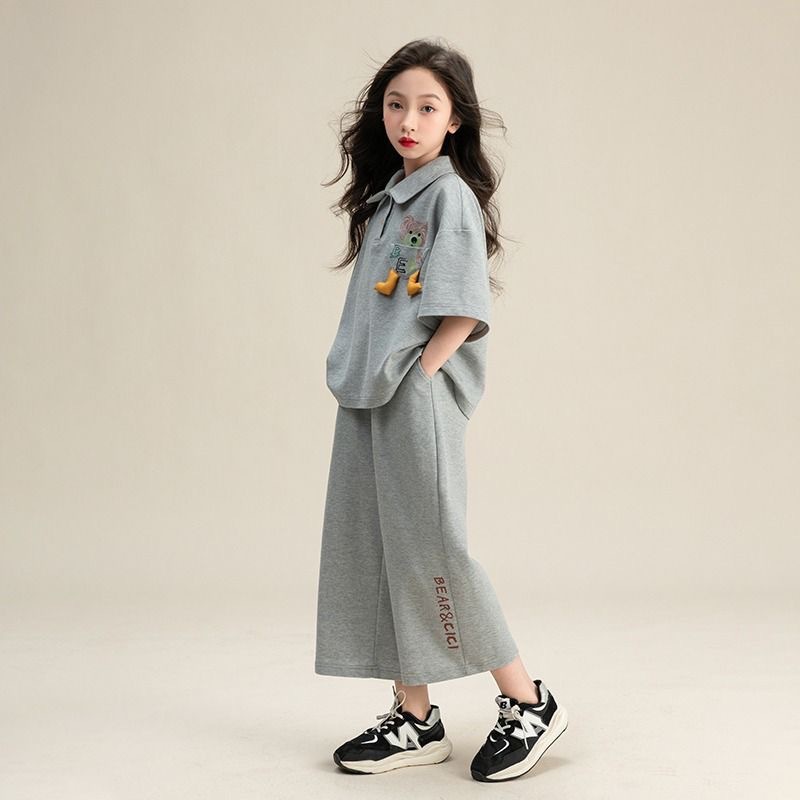 Internet celebrity girls' casual suit, summer new style, western-style cartoon short sleeved fashionable wide leg pants two-piece set, trendy