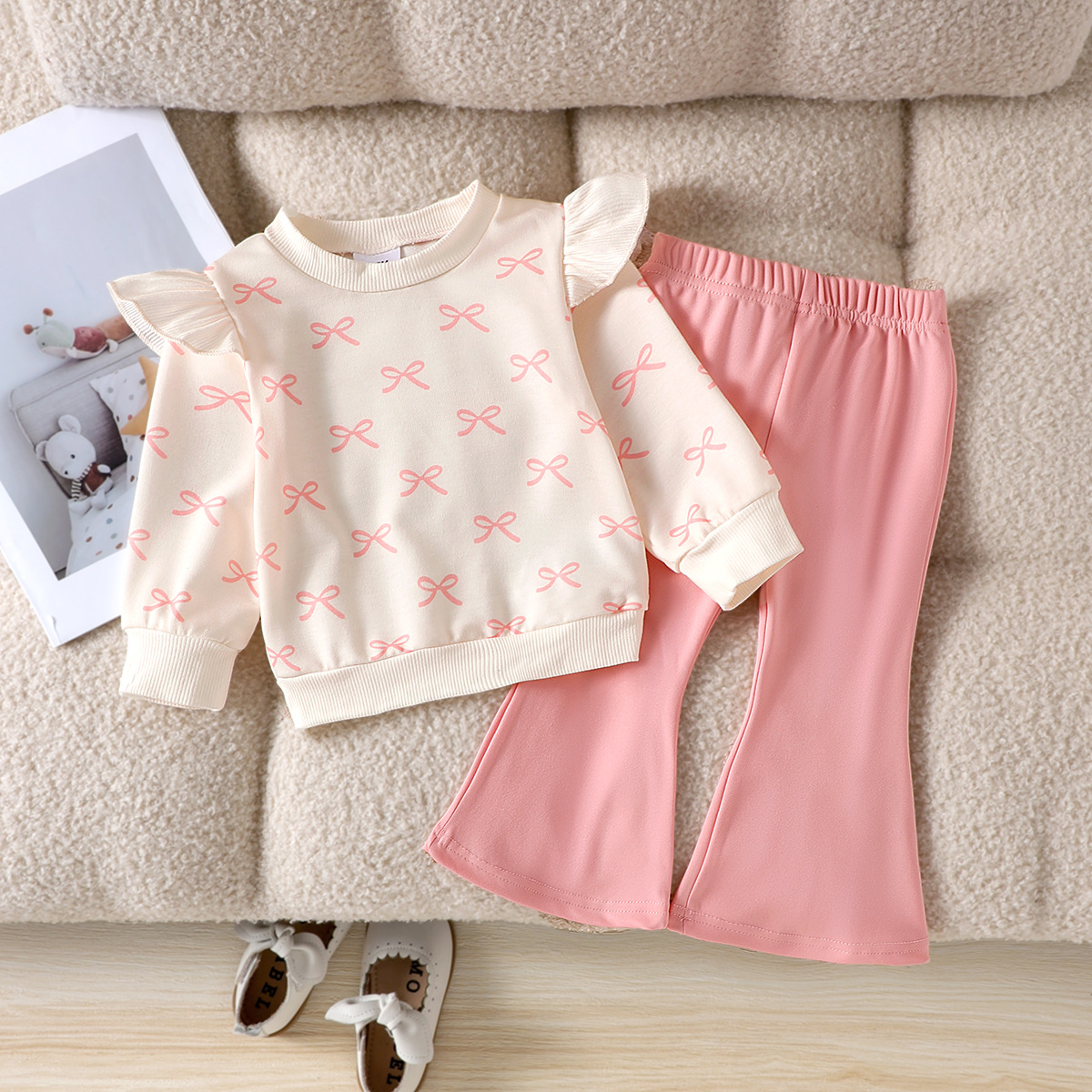Girls' autumn outfit with bow print long sleeved top paired with pink flared pants two-piece set