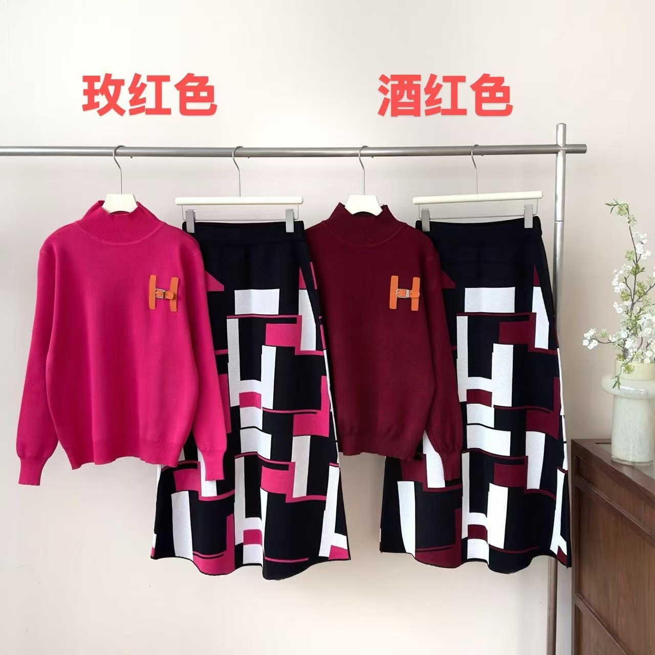 European fashion and high-end casual knitted sweater set for women's winter anti-aging letter half body long skirt two-piece set European fashion and high-end casual knitted sweater set for women's winter anti-aging letter half body long skirt two-piece set