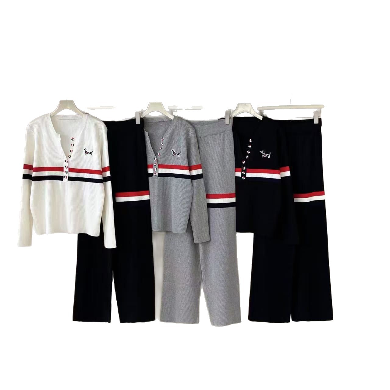 Cross border Spring and Autumn New Women's Collar Color Buckle Dog Color blocked Long sleeved Knitted Sweater Fashion Versatile Wide Leg Pants Two Piece Set Cross border Spring and Autumn New Women's Collar Color Buckle Dog Color blocked Long sleeved Knitted Sweater Fashion Versatile Wide Leg Pants Two Piece Set