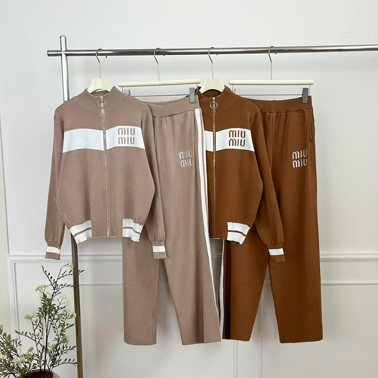 Cross border Spring New High end Leisure Fashion Sports Knitted Set Women's Contrast Splicing Casual Coat Wide Leg Pants