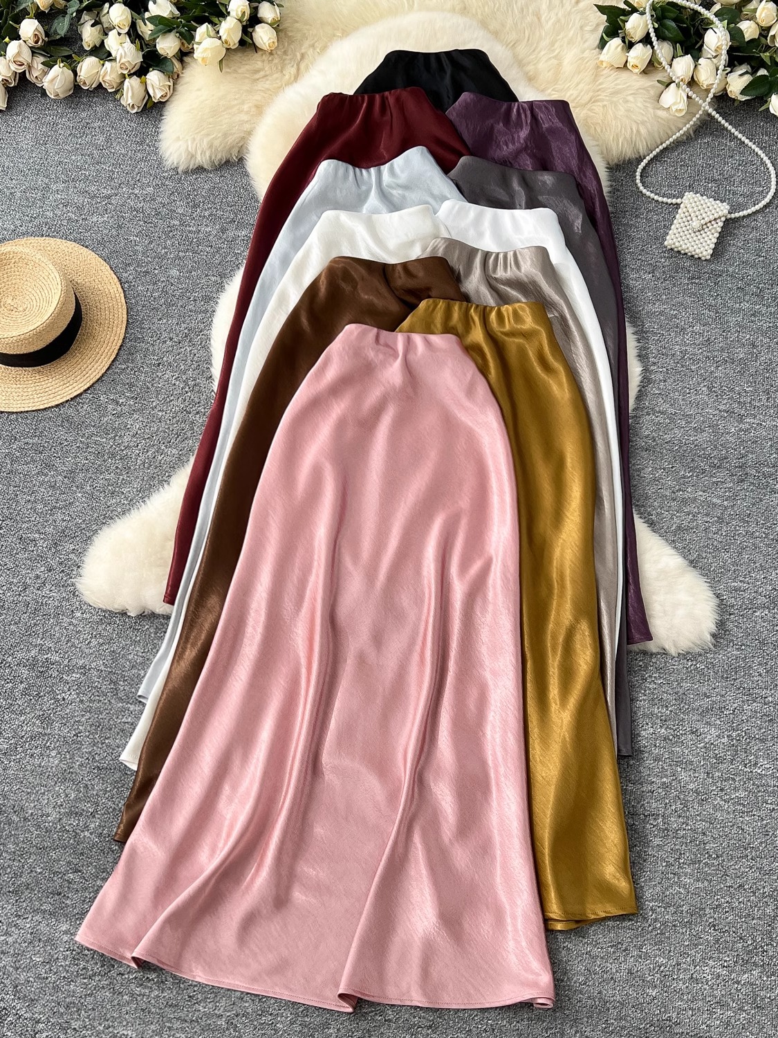 High end satin midi skirt for women 2025 new style, light luxury, high waist, slimming A-line package, hip sagging sensation, fish tail mid length skirt