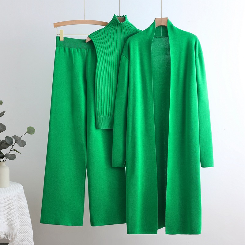 Autumn and winter goddess style long windbreaker, high neck, inner vest, sweater, elastic waist, wide leg pants, knitted three piece set Autumn and winter goddess style long windbreaker, high neck, inner vest, sweater, elastic waist, wide leg pants, knitted three piece set