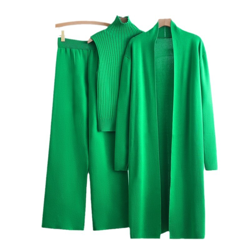 Autumn and winter goddess style long windbreaker, high neck, inner vest, sweater, elastic waist, wide leg pants, knitted three piece set Autumn and winter goddess style long windbreaker, high neck, inner vest, sweater, elastic waist, wide leg pants, knitted three piece set