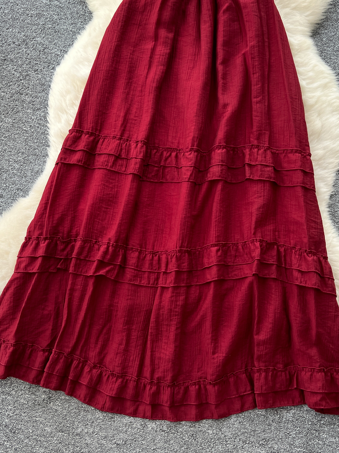 Red vacation style dress for women in summer 2025, French style, pure desire, waist cinching temperament, suspender, mushroom edge, backless long skirt Red vacation style dress for women in summer 2025, French style, pure desire, waist cinching temperament, suspender, mushroom edge, backless long skirt