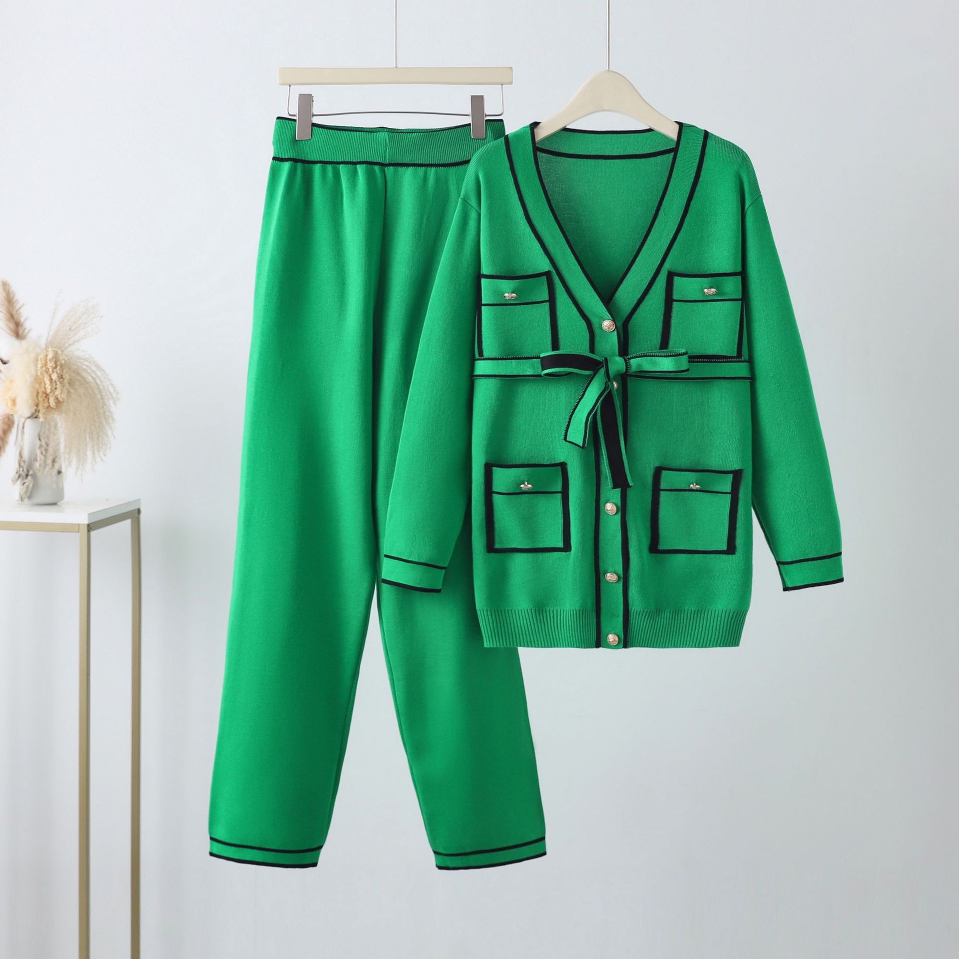 Fashionable long sleeved retro knitted contrasting color set, single row pocket cardigan, high waist wide leg pants, two piece set for covering flesh, foreign trade