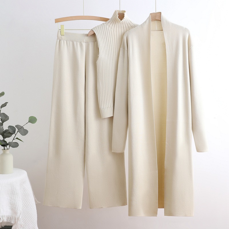 Autumn and winter goddess style long windbreaker, high neck, inner vest, sweater, elastic waist, wide leg pants, knitted three piece set Autumn and winter goddess style long windbreaker, high neck, inner vest, sweater, elastic waist, wide leg pants, knitted three piece set