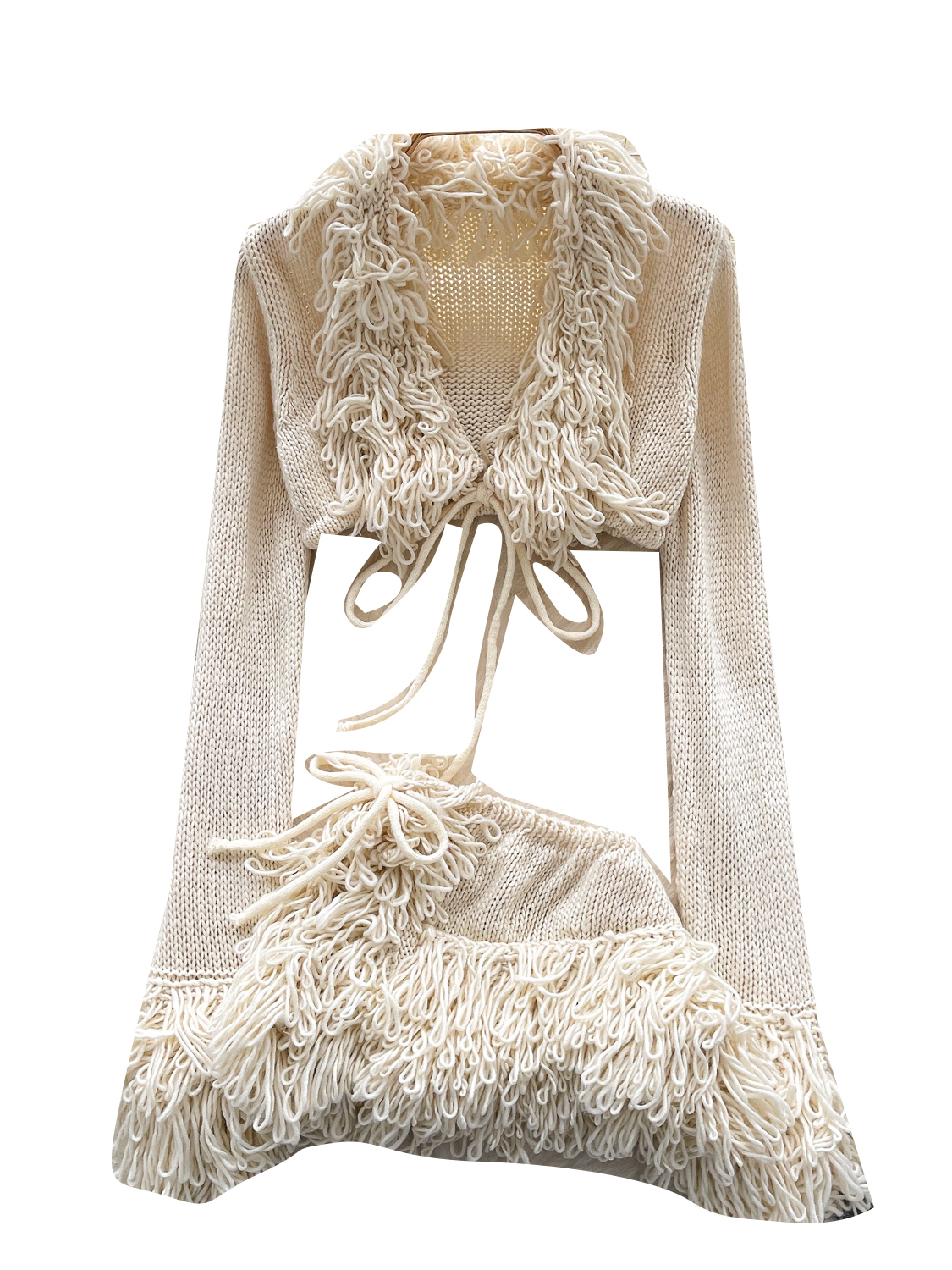 Knitted suit for women, European and American sexy spicy girl, V-neck strap, long sleeved short cut, rough edge cover, high waisted irregular short skirt Knitted suit for women, European and American sexy spicy girl, V-neck strap, long sleeved short cut, rough edge cover, high waisted irregular short skirt