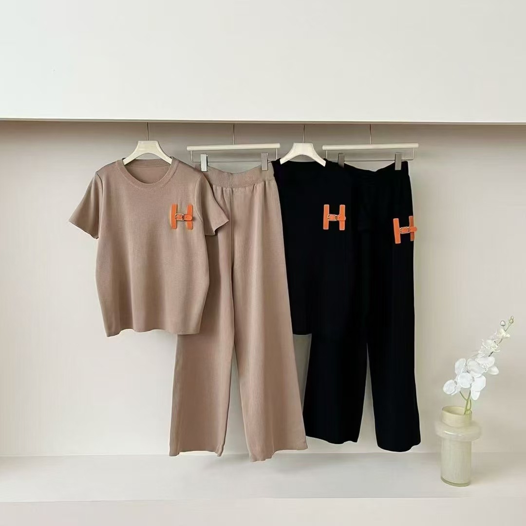 New leather label simple solid color pullover short sleeved wide leg pants knitted two-piece set, foreign trade trend versatile set for women