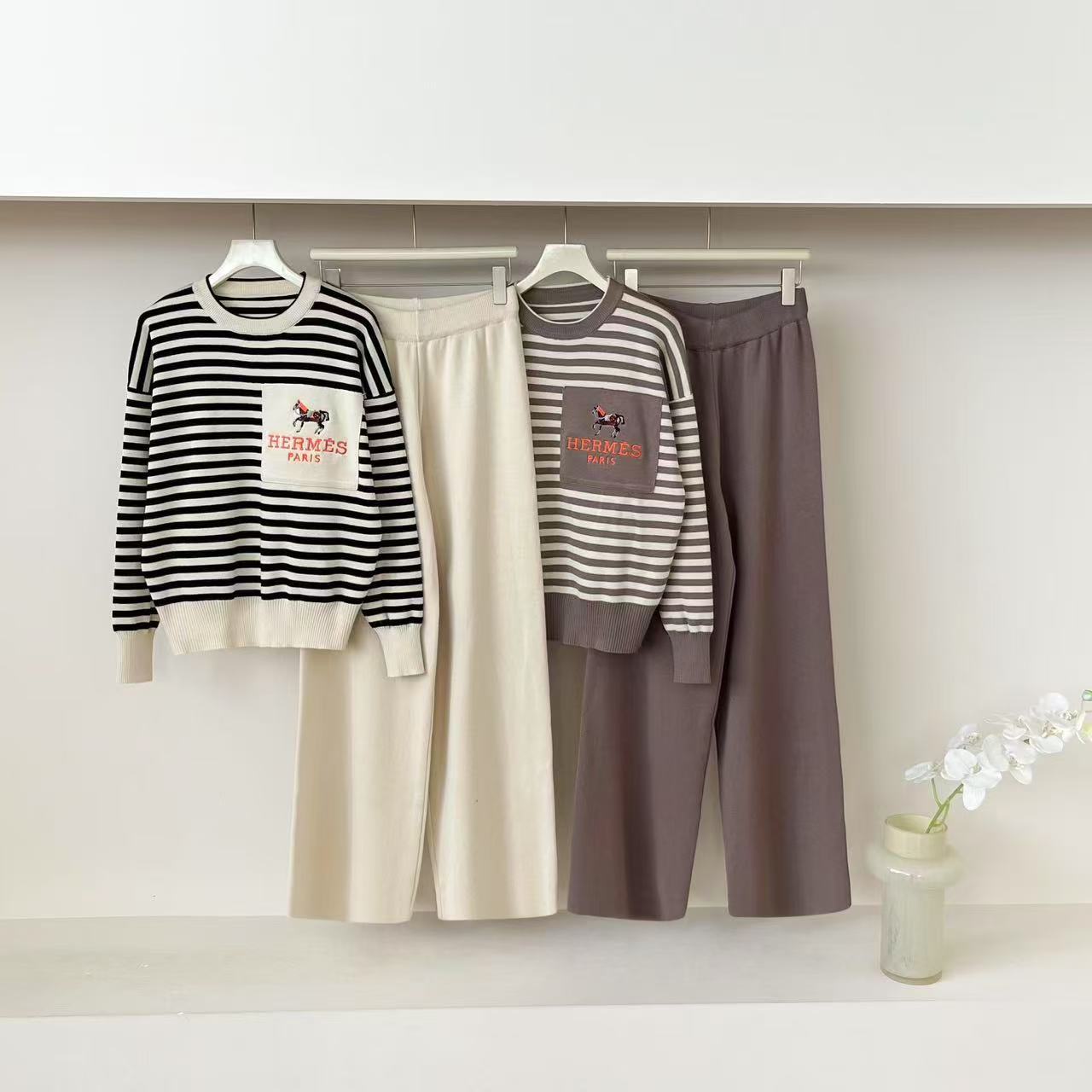 Cross border 2025 round neck pullover knitted striped top, casual high waisted wide leg pants two-piece set, spring and autumn new popular items Cross border 2025 round neck pullover knitted striped top, casual high waisted wide leg pants two-piece set, spring and autumn new popular items