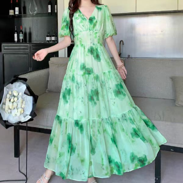 2025 summer women's niche French high-end V-neck bubble sleeves, waist cinching printed large swing ruffle edge dress