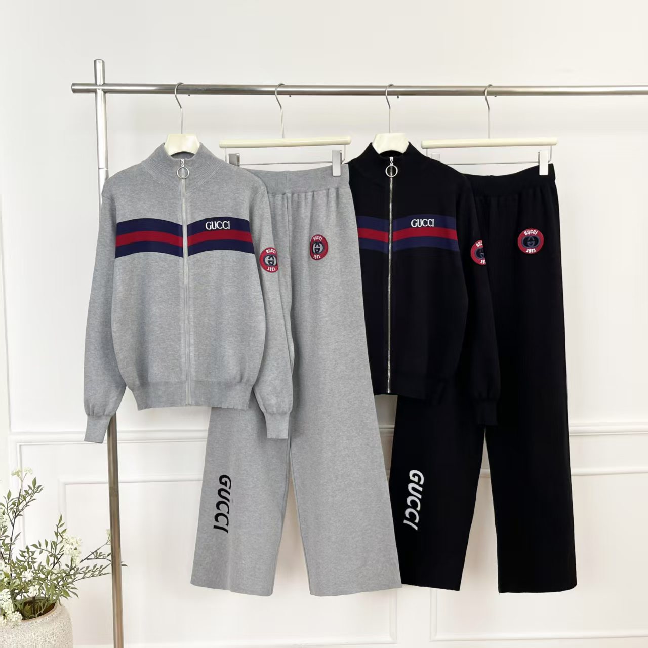 Cross border 2025 new spring women's knitted suit, fashionable and casual trend stand up collar cardigan casual pants two-piece set