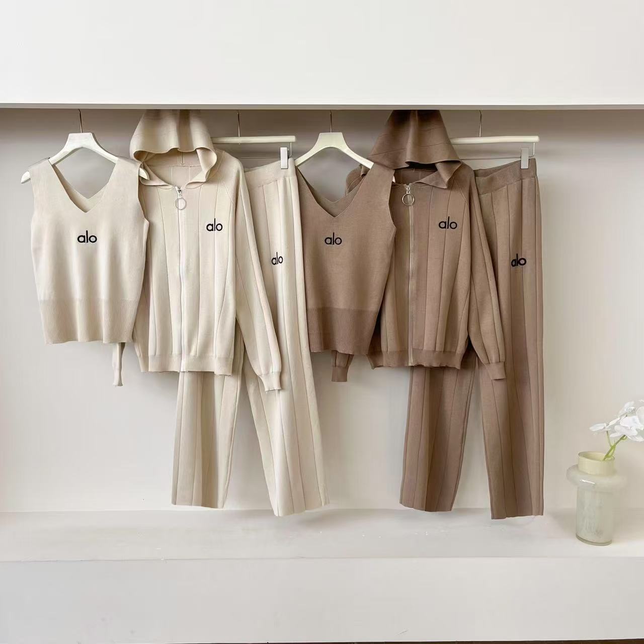 Cross border minimalist design knitted three piece set, 2025 solid color casual vest fashion cardigan, slimming and wide leg pants Cross border minimalist design knitted three piece set, 2025 solid color casual vest fashion cardigan, slimming and wide leg pants