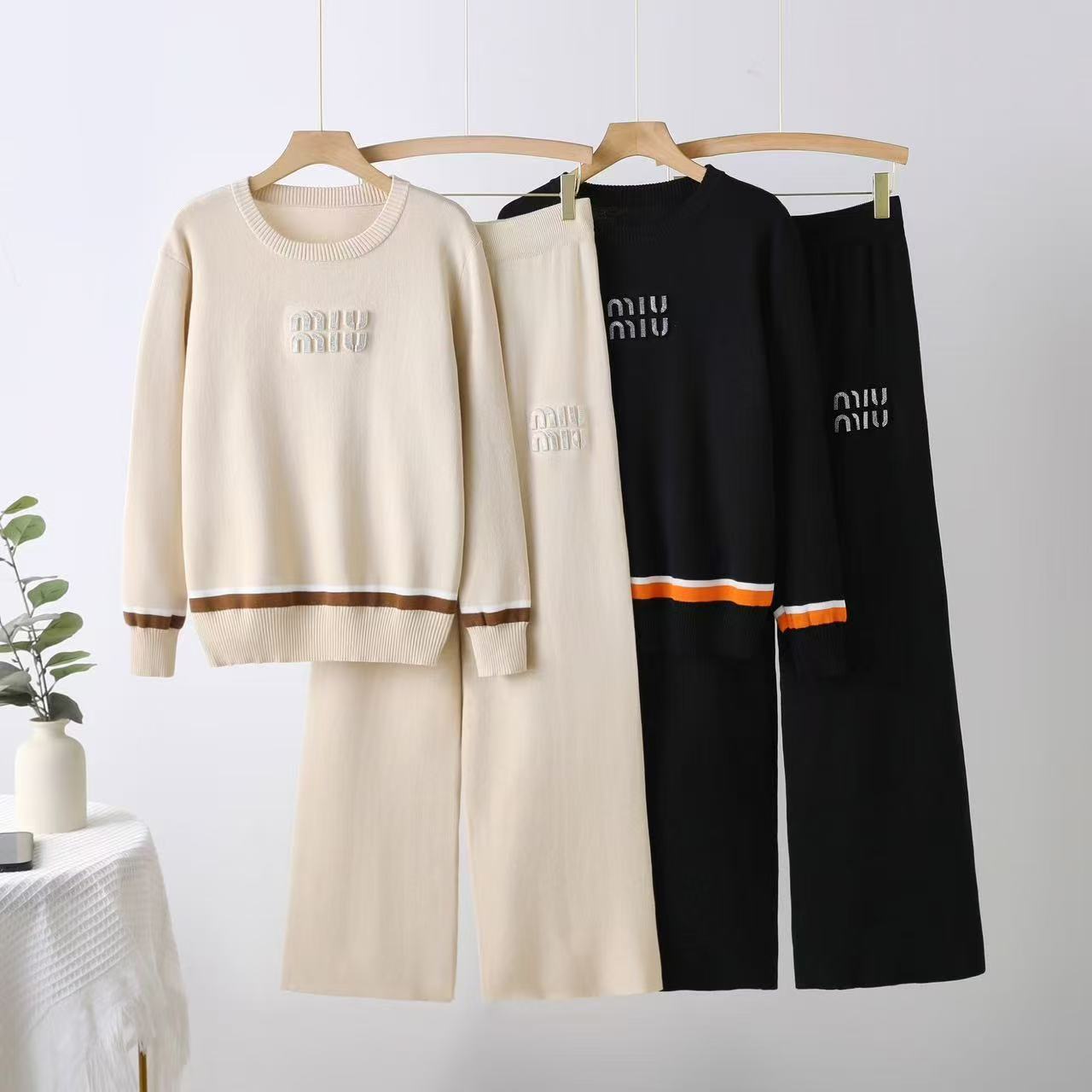 Cross border women's knitted suit early spring new fashionable and versatile commuting letter printed knitted top with high waist and wide legs Cross border women's knitted suit early spring new fashionable and versatile commuting letter printed knitted top with high waist and wide legs
