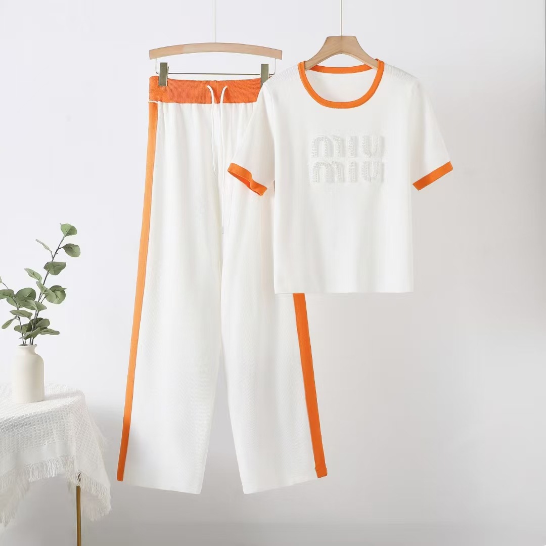 25 year spring and summer fashion brand hot stamping diamond letter round neck versatile short sleeved knitted top long pants casual two-piece set foreign trade 25 year spring and summer fashion brand hot stamping diamond letter round neck versatile short sleeved knitted top long pants casual two-piece set foreign trade