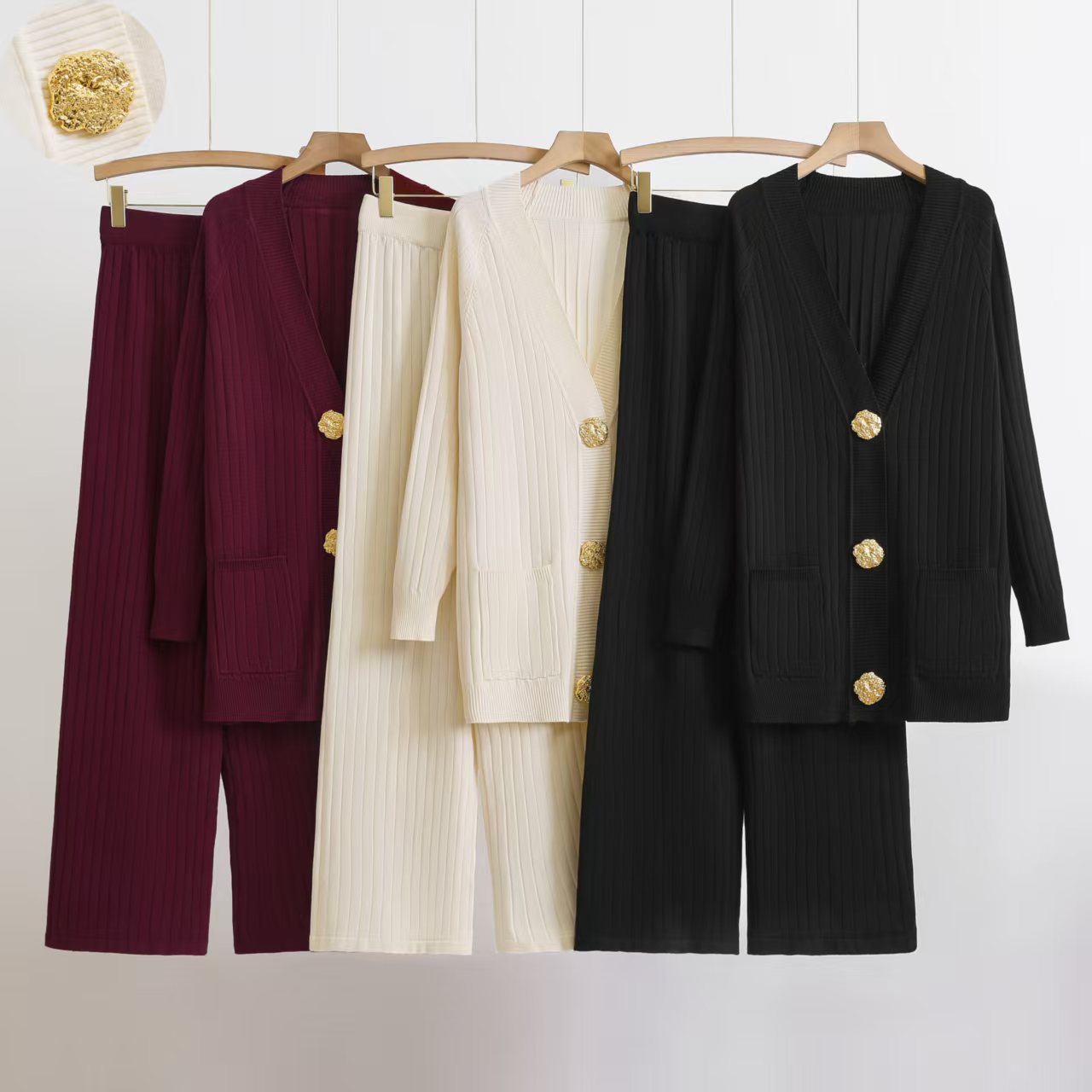 Cross border European and American autumn and winter new metal button cardigan 2025 wide leg pants knitted medium long jacket two-piece set