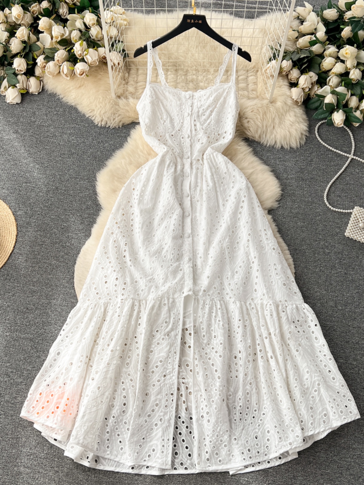 Seaside vacation style printed camisole dress for women in summer with hollowed out slit design, niche and unique super fairy long dress Seaside vacation style printed camisole dress for women in summer with hollowed out slit design, niche and unique super fairy long dress