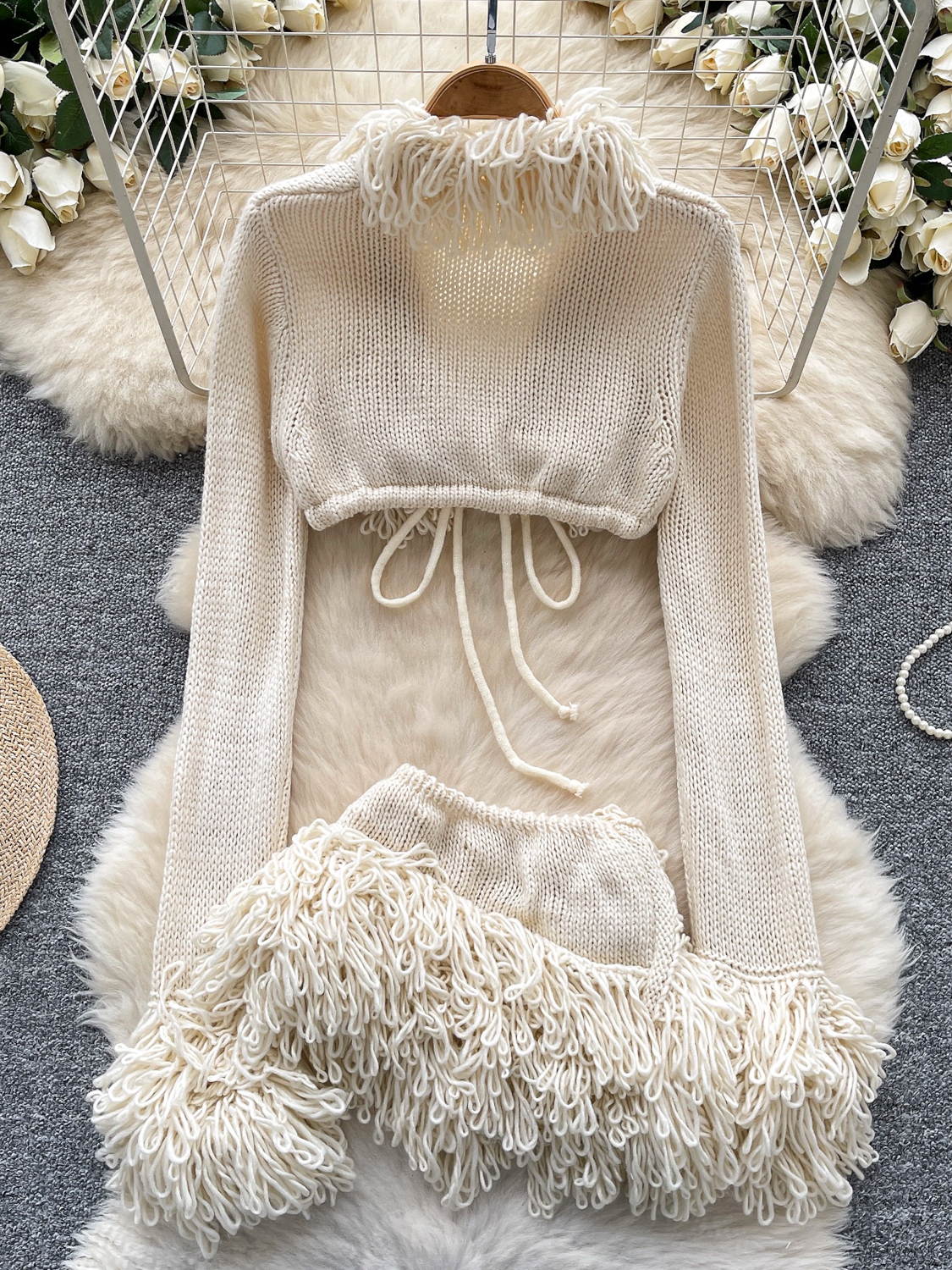 Knitted suit for women, European and American sexy spicy girl, V-neck strap, long sleeved short cut, rough edge cover, high waisted irregular short skirt Knitted suit for women, European and American sexy spicy girl, V-neck strap, long sleeved short cut, rough edge cover, high waisted irregular short skirt