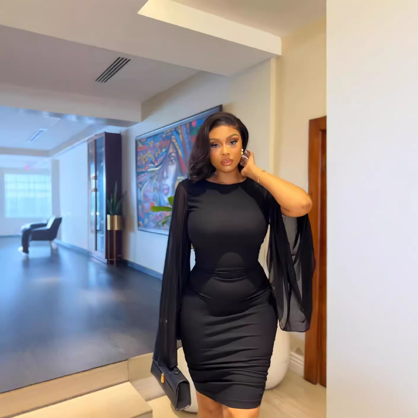 European and American Cross border Women's 2024 Autumn New Solid Color Round Neck Trumpet Sleeves Sexy Backless Tight Dress with Hip Wrap