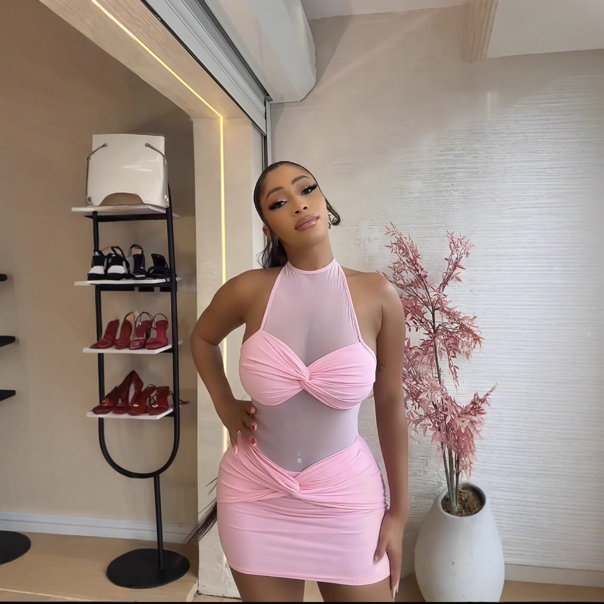 European and American Cross border Women's Wear 2025 Early Autumn New Solid Color Sleeveless Hanging Neck Tight Sexy Bag Hip Short Dress