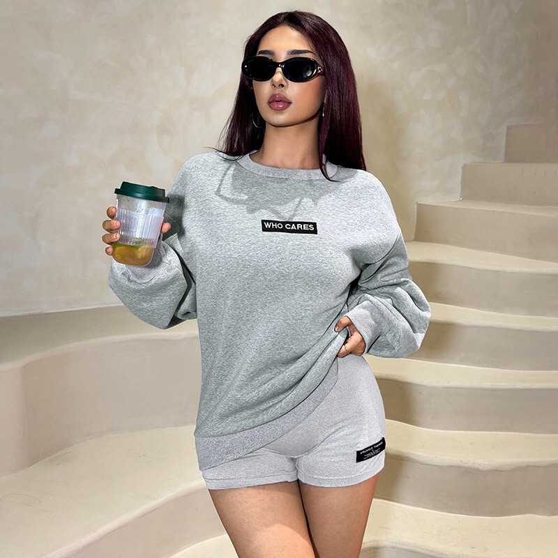 European and American cross-border women's clothing 2025 early summer new solid color long sleeved round neck loose top tight shorts two-piece set