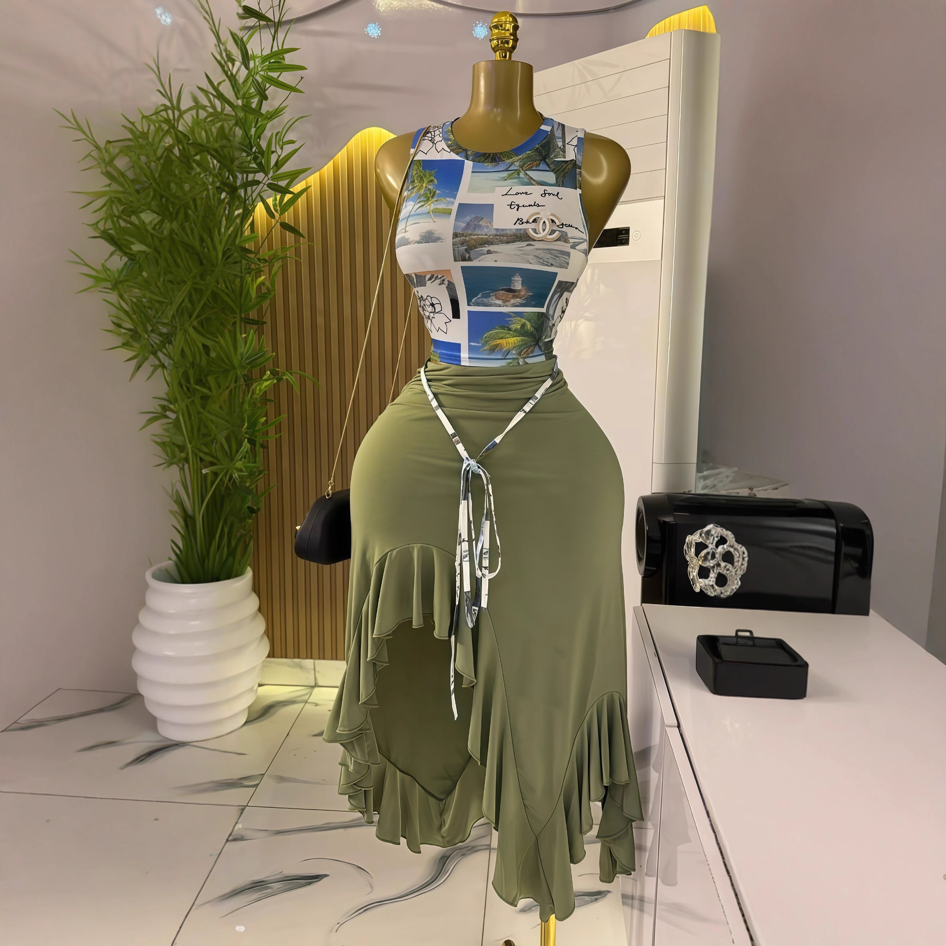 European and American cross-border women's clothing 2025 early autumn new sleeveless round neck tight fitting small top irregular half skirt two-piece set