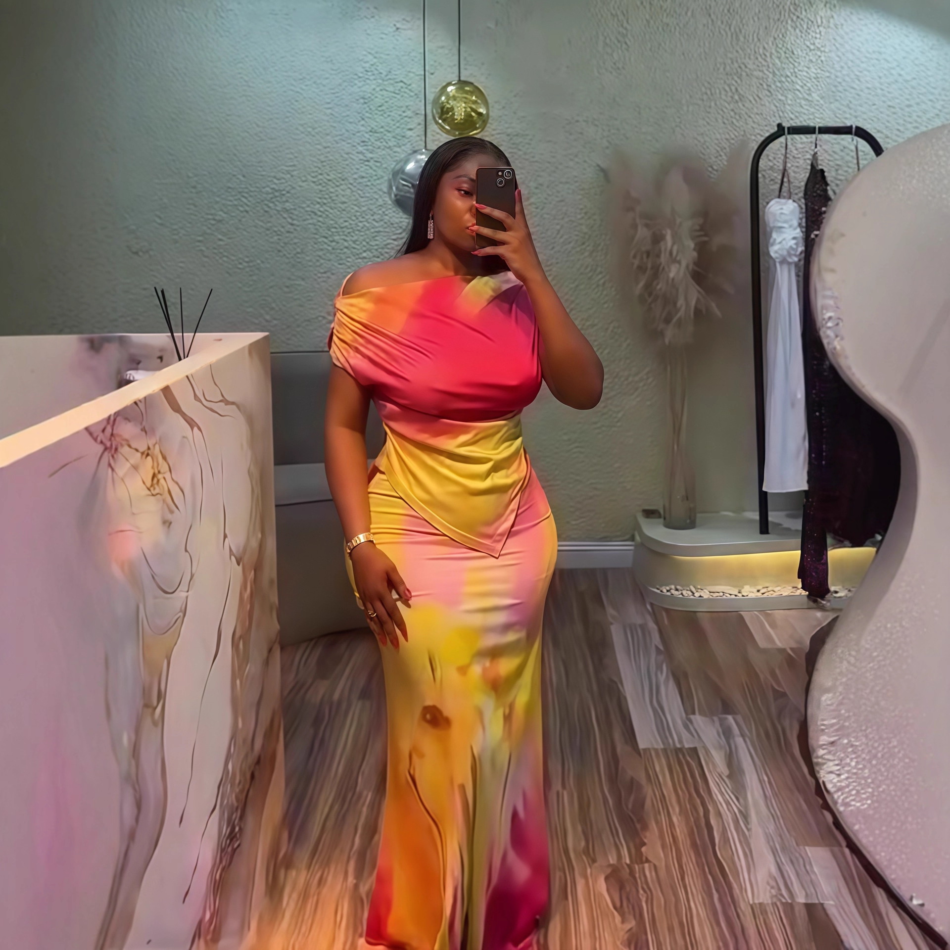 European and American Cross border Women's Wear 2025 Autumn New Collection One Word Collar Irregular Printed Top Waist Tight Skirt Two Piece Set