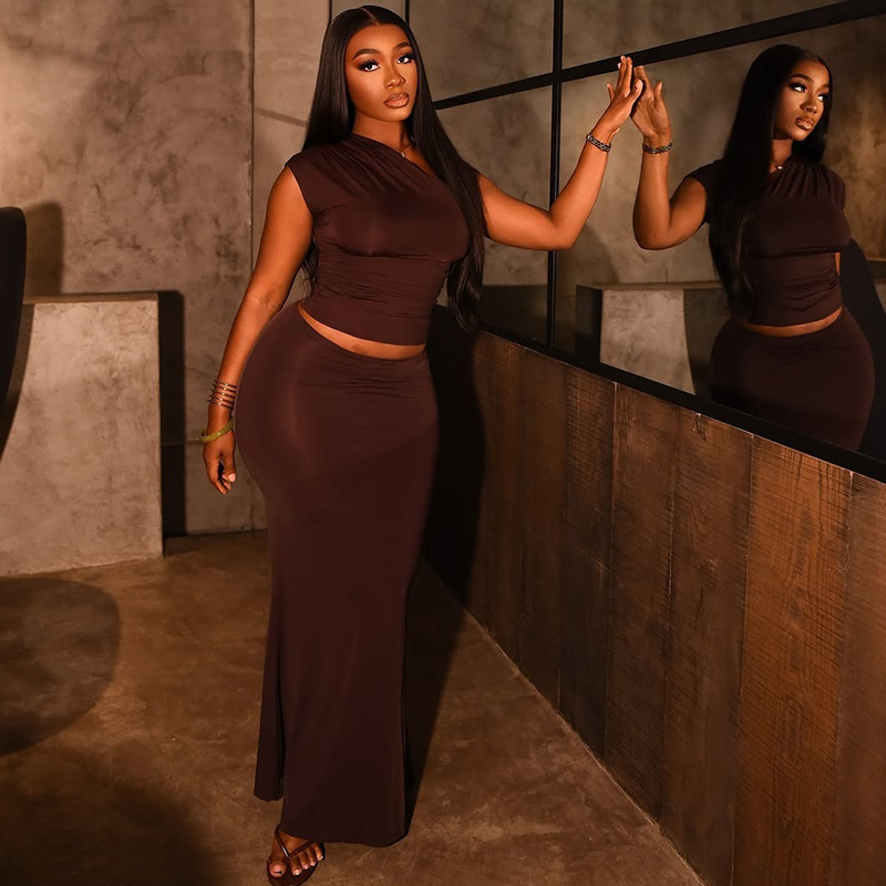 Cross border slim fit pleated fashionable solid color skirt set with European and American style, slanted collar and hip hugging one step skirt two-piece set for women's wear