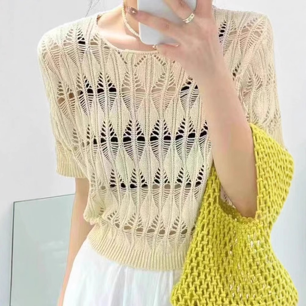 Hollow out short knitted sweater for women 2023 summer new style, loose and slimming, thin French style base shirt top Hollow out short knitted sweater for women 2023 summer new style, loose and slimming, thin French style base shirt top