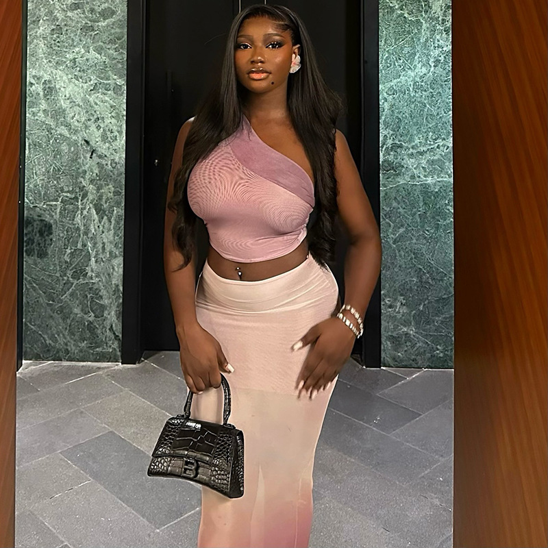 European and American style fresh and fashionable women's clothing with exposed navel, hip hugging, tight fitting gradient color skirt set, slanted collar slightly transparent long skirt two-piece set