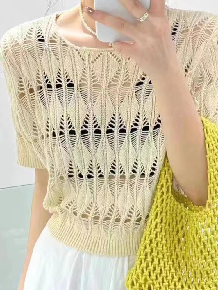Hollow out short knitted sweater for women 2023 summer new style, loose and slimming, thin French style base shirt top Hollow out short knitted sweater for women 2023 summer new style, loose and slimming, thin French style base shirt top