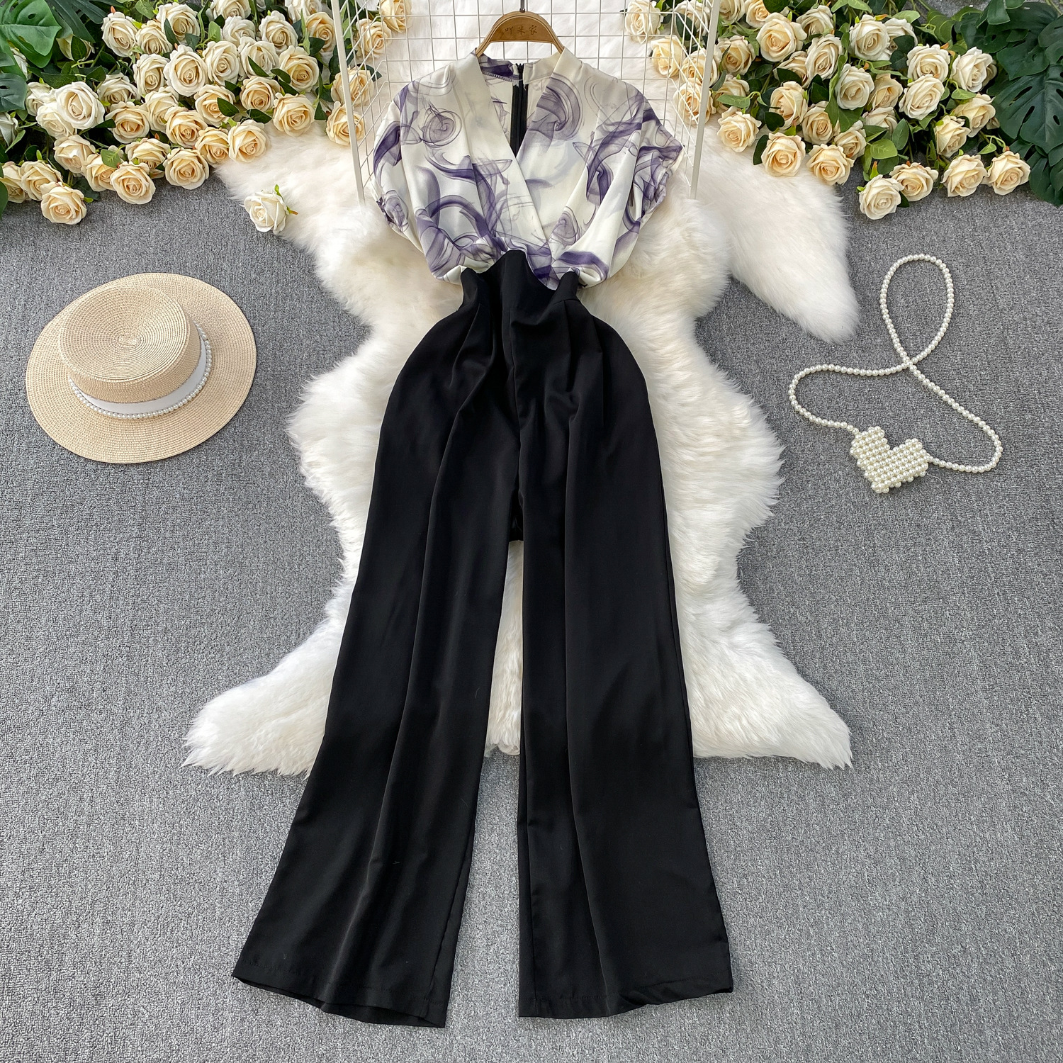 Advanced and elegant temperament print splicing V-neck short sleeved jumpsuit for women's summer new collection, waist cinching and slimming wide leg pants Advanced and elegant temperament print splicing V-neck short sleeved jumpsuit for women's summer new collection, waist cinching and slimming wide leg pants