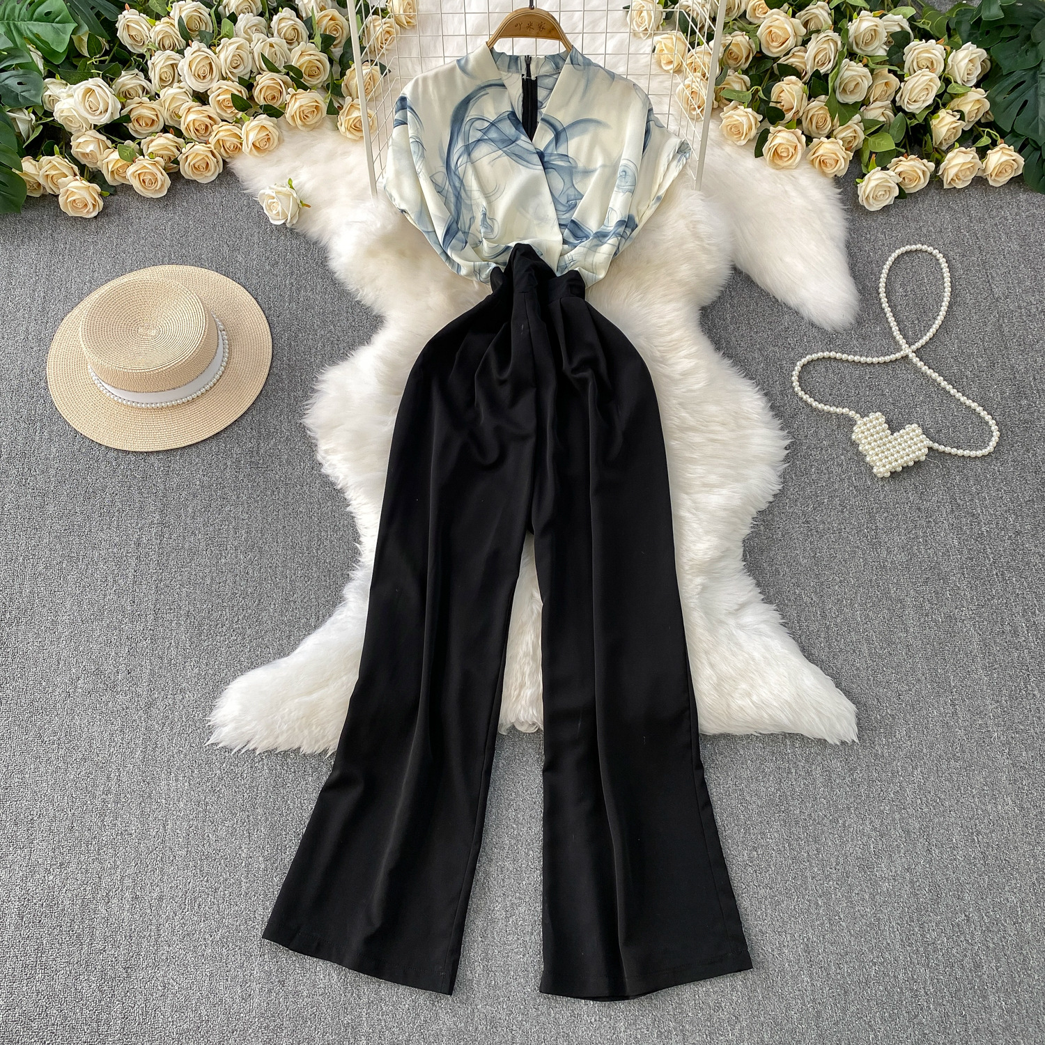 Advanced and elegant temperament print splicing V-neck short sleeved jumpsuit for women's summer new collection, waist cinching and slimming wide leg pants Advanced and elegant temperament print splicing V-neck short sleeved jumpsuit for women's summer new collection, waist cinching and slimming wide leg pants