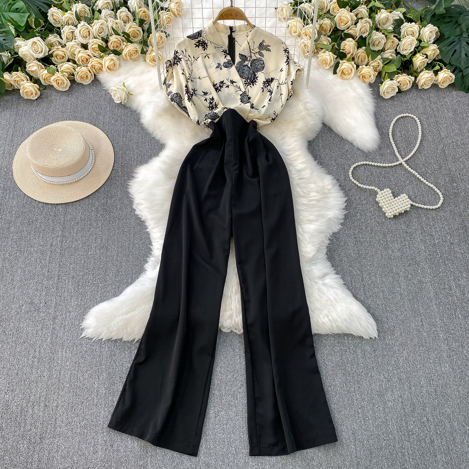 Advanced and elegant temperament print splicing V-neck short sleeved jumpsuit for women's summer new collection, waist cinching and slimming wide leg pants Advanced and elegant temperament print splicing V-neck short sleeved jumpsuit for women's summer new collection, waist cinching and slimming wide leg pants