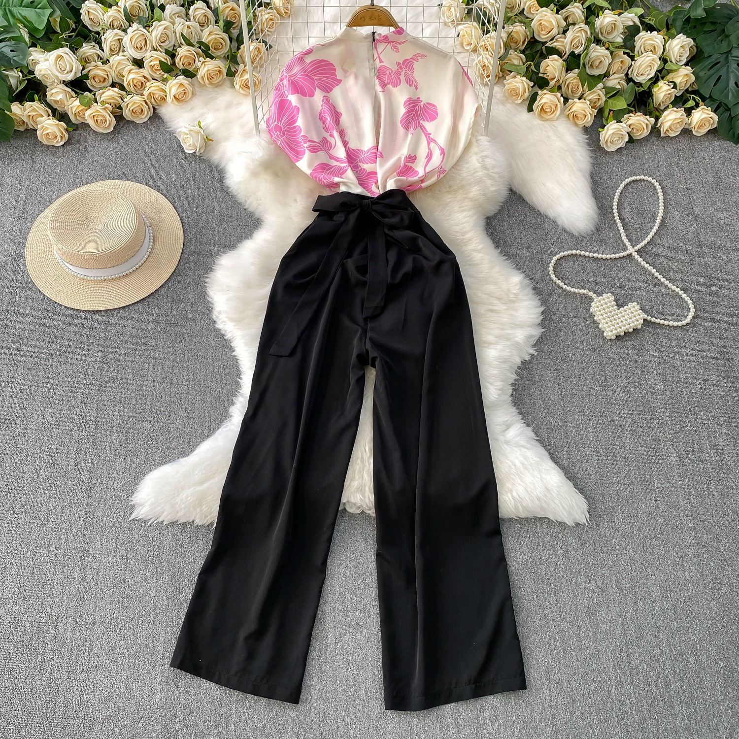 Advanced and elegant temperament print splicing V-neck short sleeved jumpsuit for women's summer new collection, waist cinching and slimming wide leg pants Advanced and elegant temperament print splicing V-neck short sleeved jumpsuit for women's summer new collection, waist cinching and slimming wide leg pants