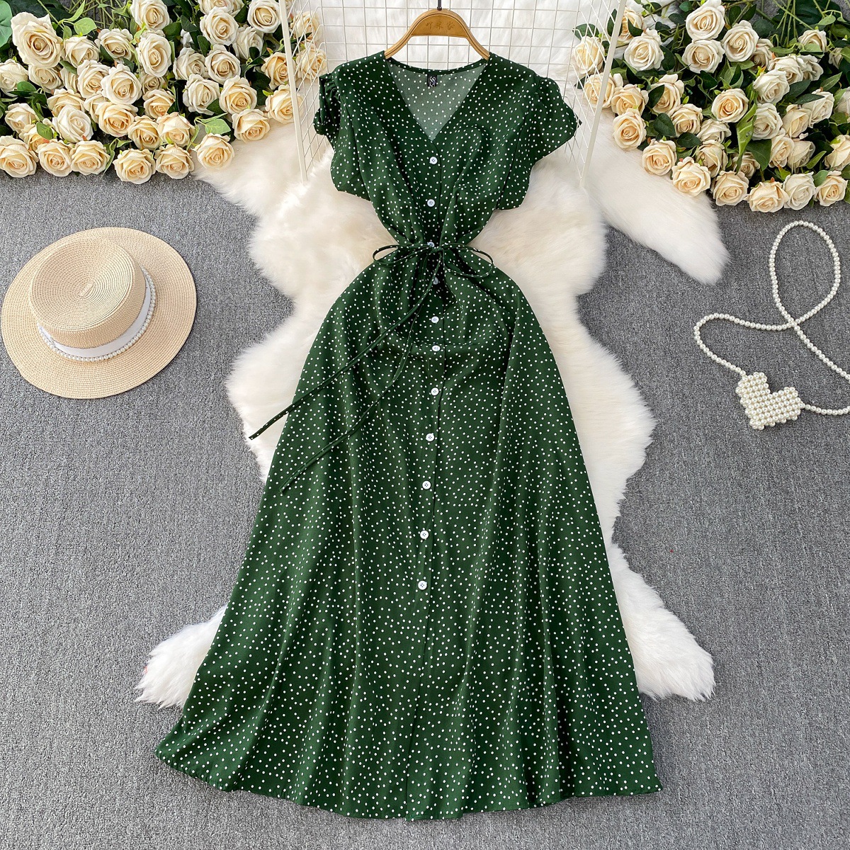 French red polka dot V-neck short sleeved dress for women in summer, with a single breasted buckle and tied waist for slimming effect. A-line medium length skirt French red polka dot V-neck short sleeved dress for women in summer, with a single breasted buckle and tied waist for slimming effect. A-line medium length skirt