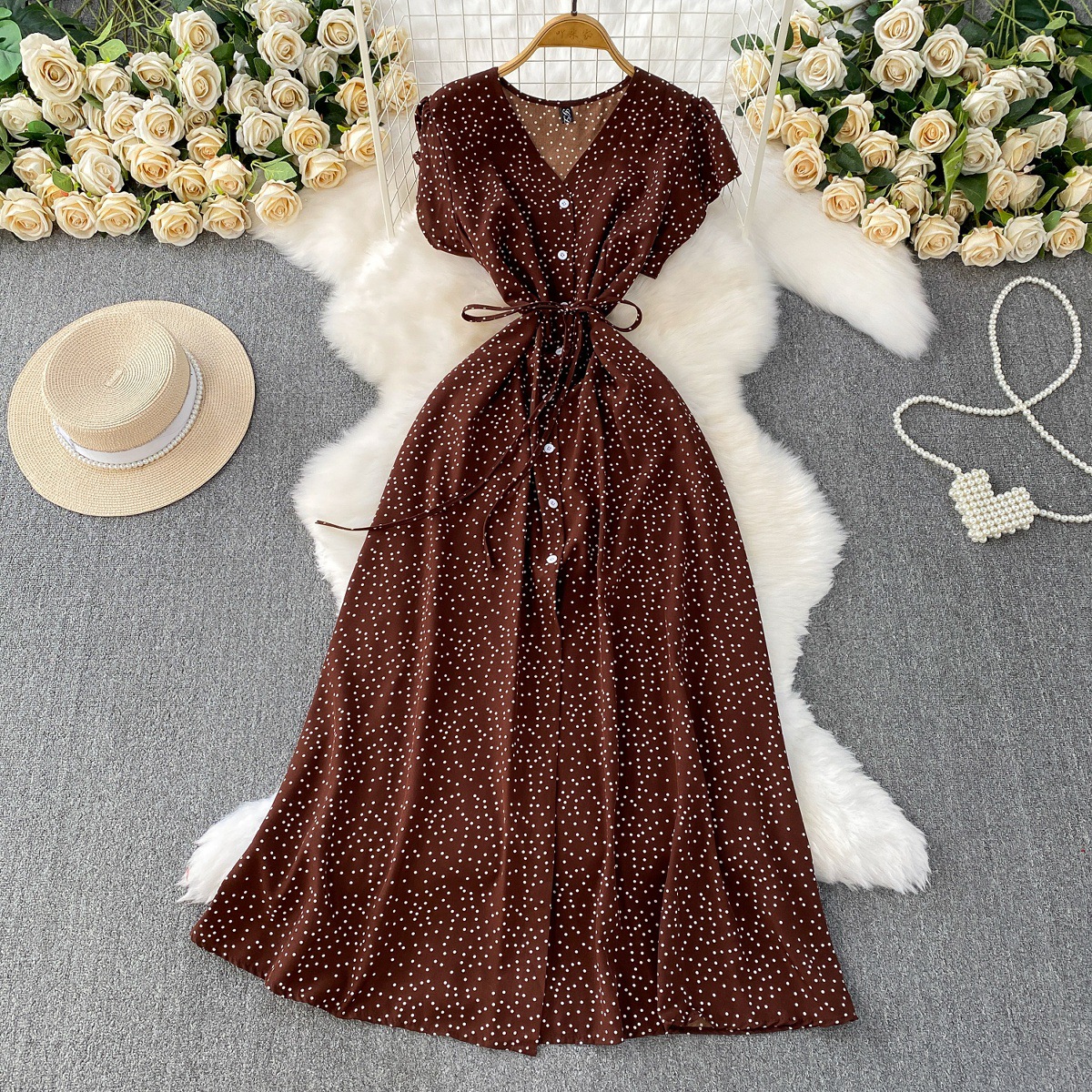 French red polka dot V-neck short sleeved dress for women in summer, with a single breasted buckle and tied waist for slimming effect. A-line medium length skirt French red polka dot V-neck short sleeved dress for women in summer, with a single breasted buckle and tied waist for slimming effect. A-line medium length skirt