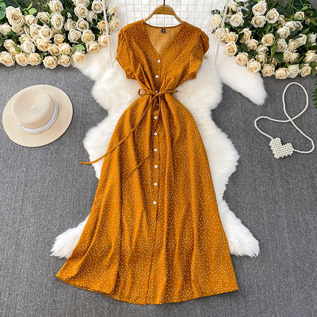 French red polka dot V-neck short sleeved dress for women in summer, with a single breasted buckle and tied waist for slimming effect. A-line medium length skirt French red polka dot V-neck short sleeved dress for women in summer, with a single breasted buckle and tied waist for slimming effect. A-line medium length skirt