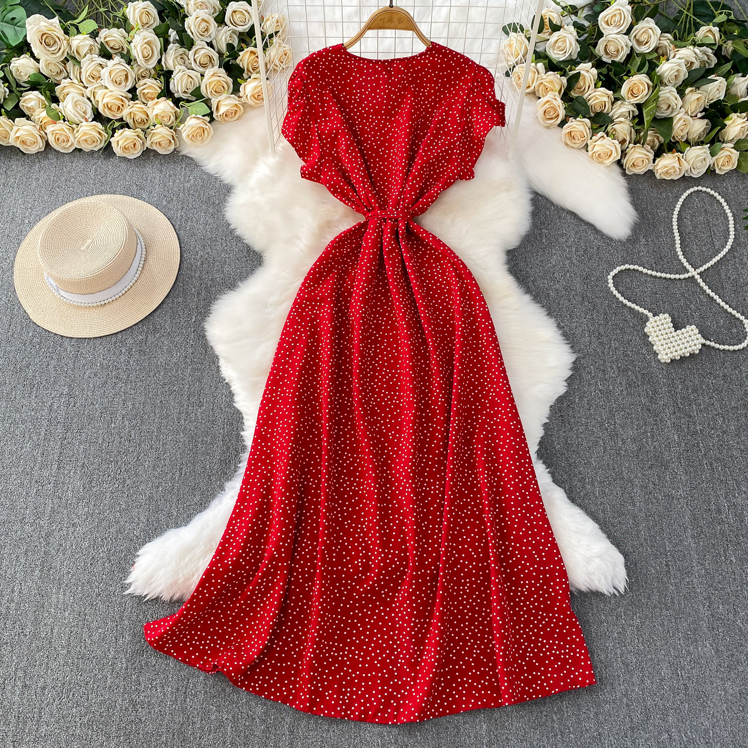 French red polka dot V-neck short sleeved dress for women in summer, with a single breasted buckle and tied waist for slimming effect. A-line medium length skirt French red polka dot V-neck short sleeved dress for women in summer, with a single breasted buckle and tied waist for slimming effect. A-line medium length skirt