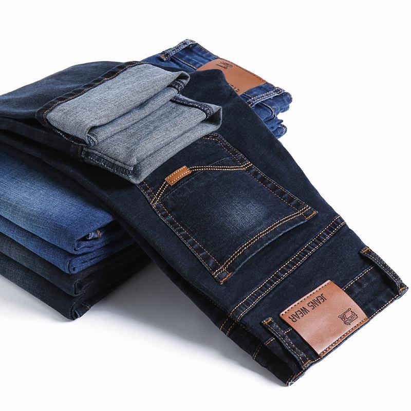 In stock summer elastic thin Dragon Trade men's jeans straight tube loose casual special offer men's work wear-resistant pants