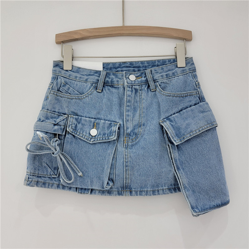 Irregular workwear denim short skirt for women in spring and summer, high waist, slimming effect, A-line anti slip, hip hugging, spicy girl half body skirt, trendy