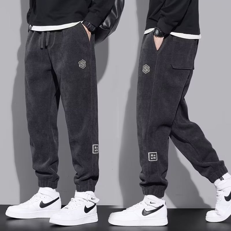 New sports pants for men in autumn and winter, with added fleece and thick casual pants. Bathroom pants with loose leg ties