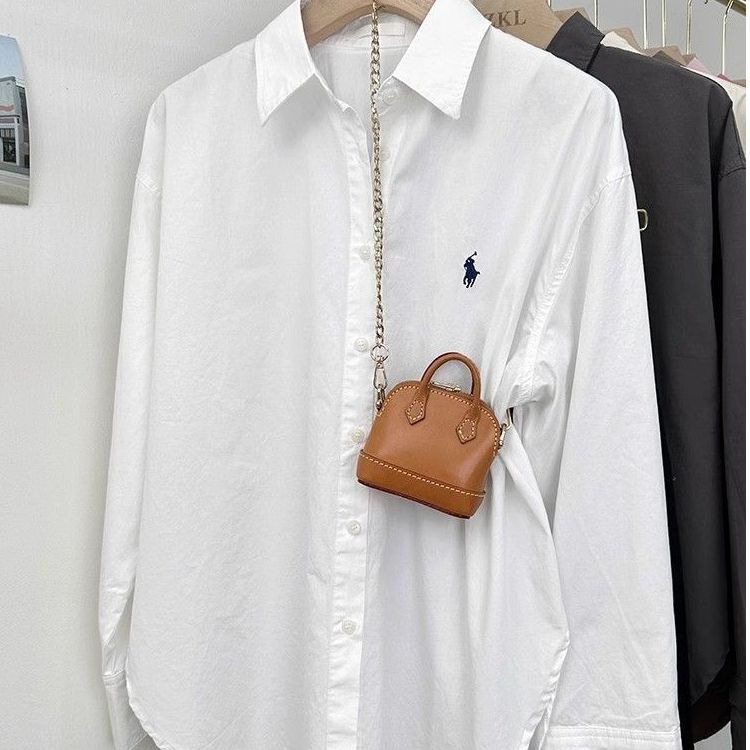 Pony embroidered shirt for women, loose Korean style, simple and high-end design, commuting shirt, fashionable and casual long sleeved top Pony embroidered shirt for women, loose Korean style, simple and high-end design, commuting shirt, fashionable and casual long sleeved top