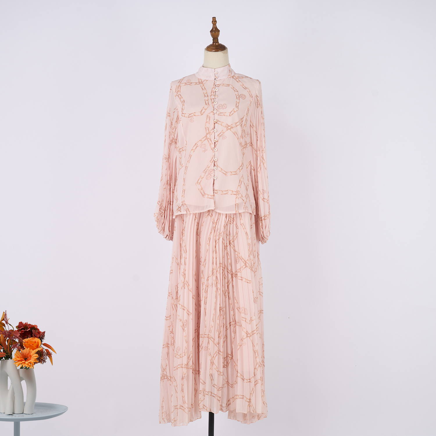 Real time photo of pleated long sleeved shirt paired with skirt set, oversized skirt and elastic waist set