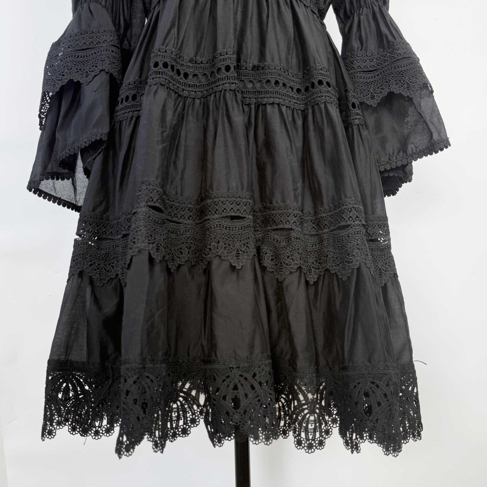 Realistic shooting of French elegant early autumn flared sleeves with heavy embroidery and hollow out vacation style dress, short lace skirt Realistic shooting of French elegant early autumn flared sleeves with heavy embroidery and hollow out vacation style dress, short lace skirt