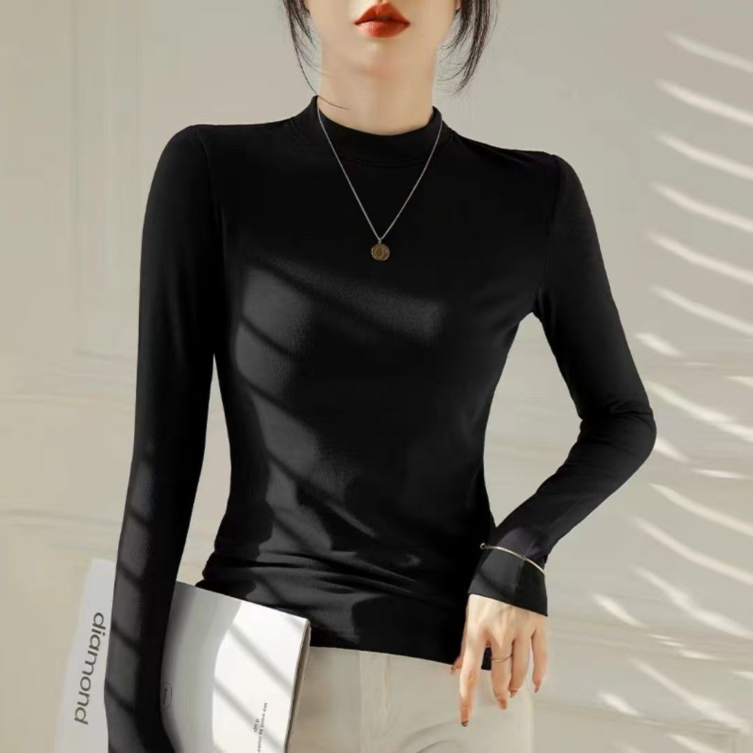 Slimming and slimming long sleeved T-shirt for women in autumn and winter 2025, with a niche and casual design, versatile temperament, round neck base shirt Slimming and slimming long sleeved T-shirt for women in autumn and winter 2025, with a niche and casual design, versatile temperament, round neck base shirt