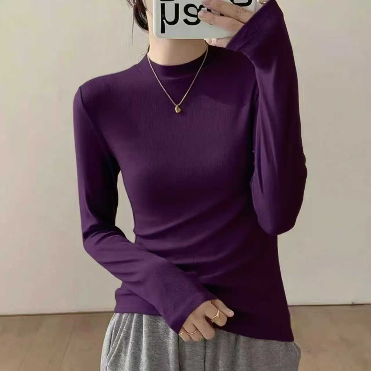 Slimming and slimming long sleeved T-shirt for women in autumn and winter 2025, with a niche and casual design, versatile temperament, round neck base shirt Slimming and slimming long sleeved T-shirt for women in autumn and winter 2025, with a niche and casual design, versatile temperament, round neck base shirt